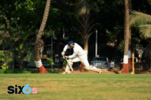 batsman playing short with a bat in the betting ground